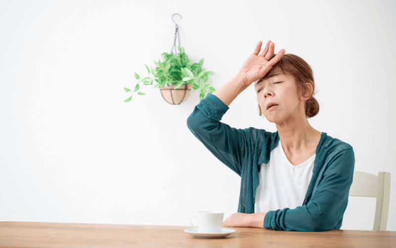 体調が悪そうな女性